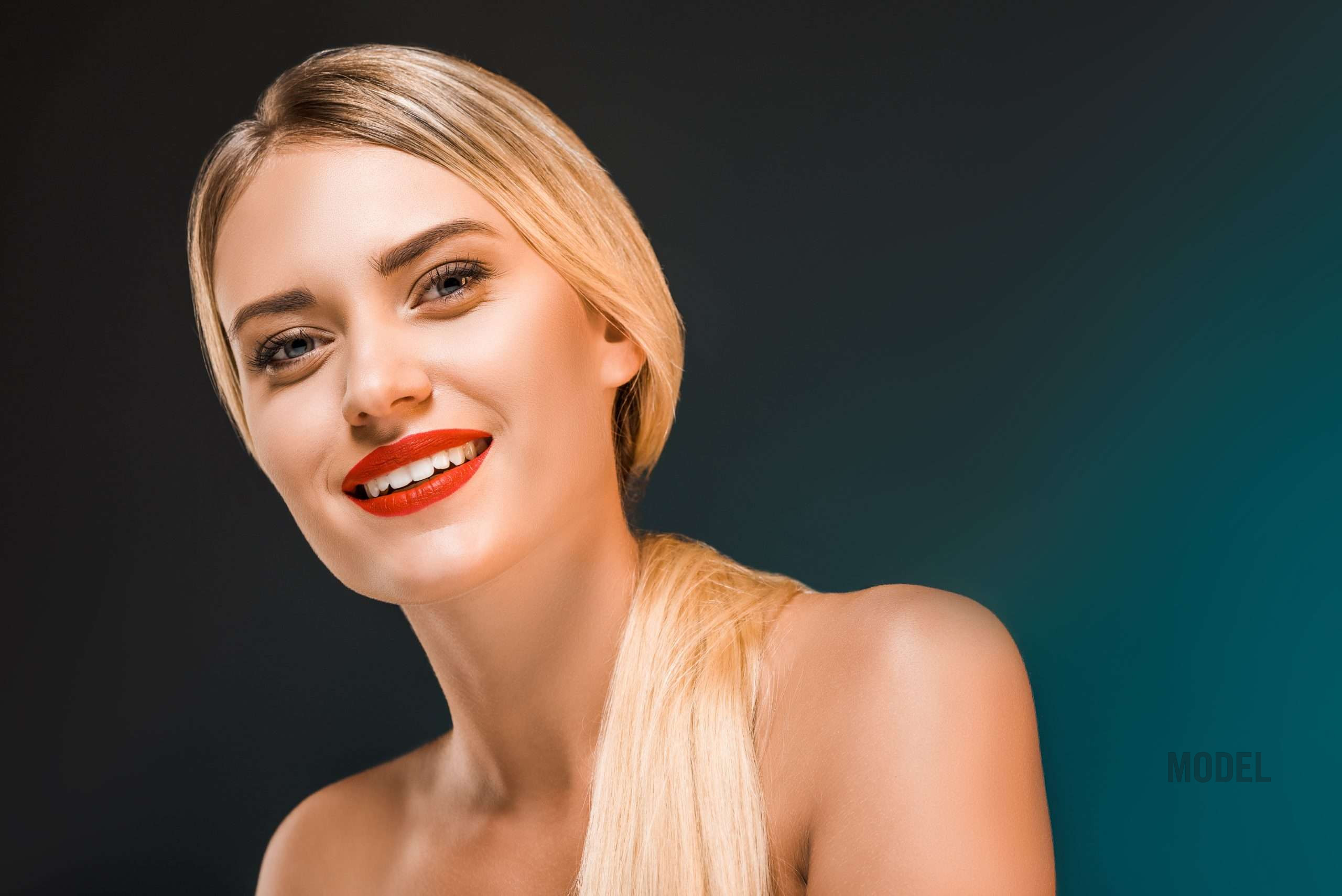 Confident smiling woman representing readiness for plastic surgery in Santa Monica and Los Angeles