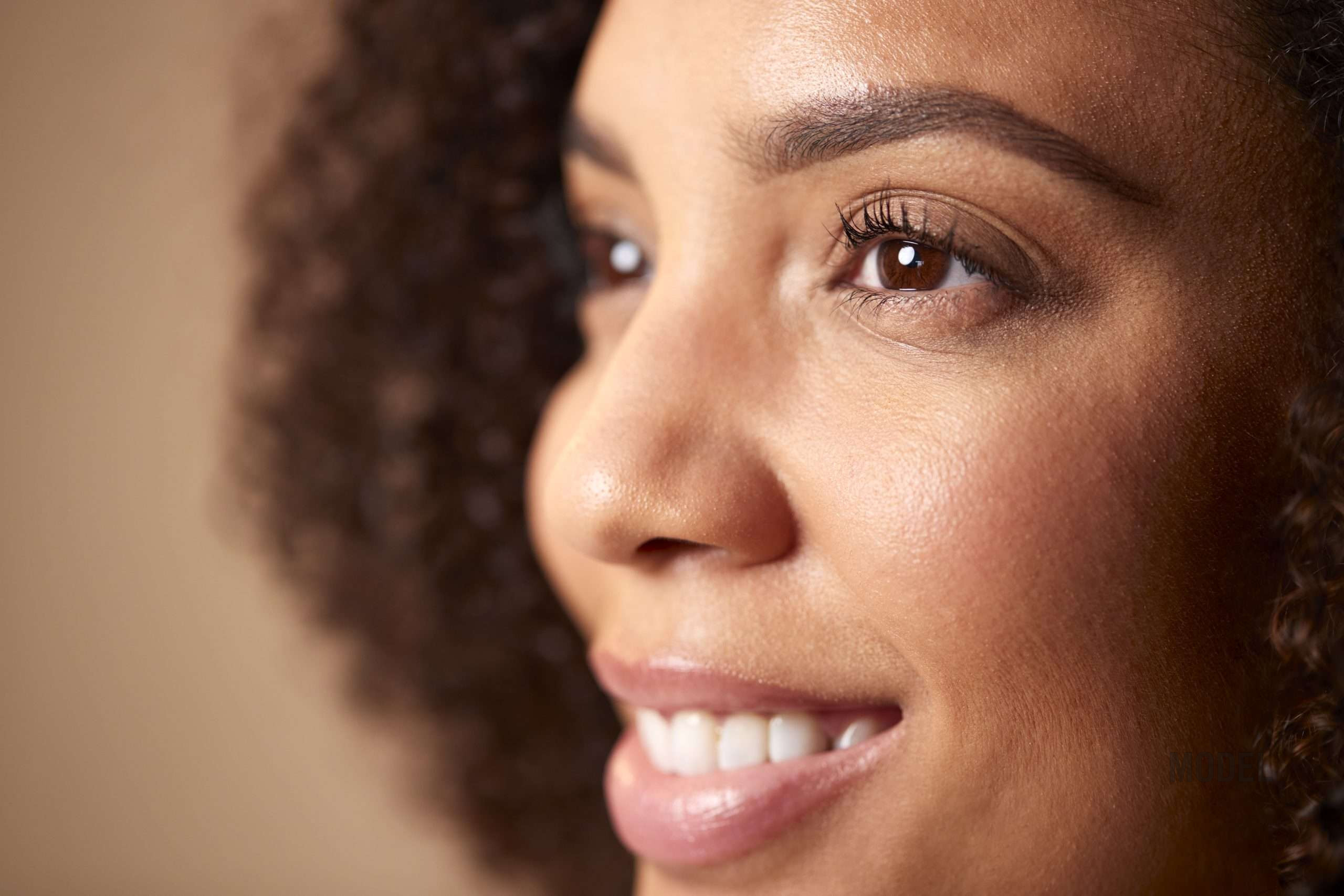 Woman comparing facelift, neck lift, and Ponytail Lift procedures in Santa Monica